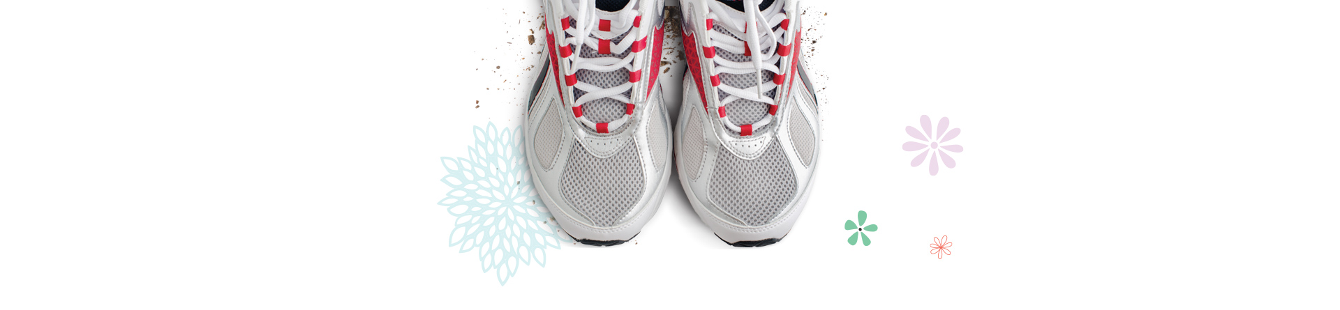 Pair of sneakers on colorful floral background