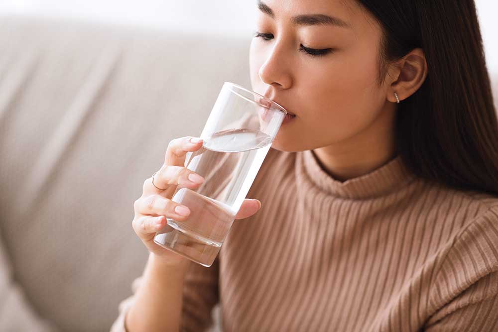 Lady drinking water