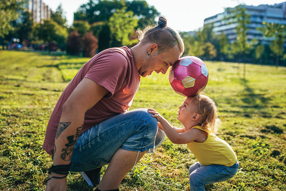 Dad-daughter-playing-outside