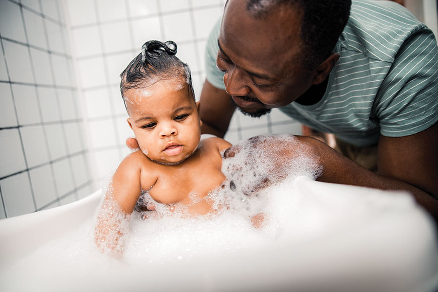 DadBathingBaby