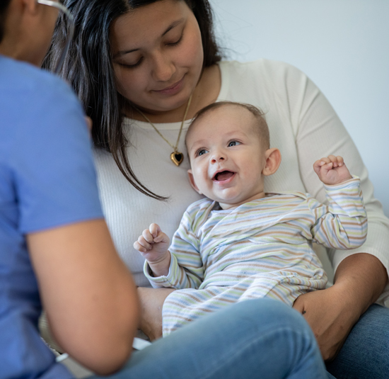 A lady at hospital with baby